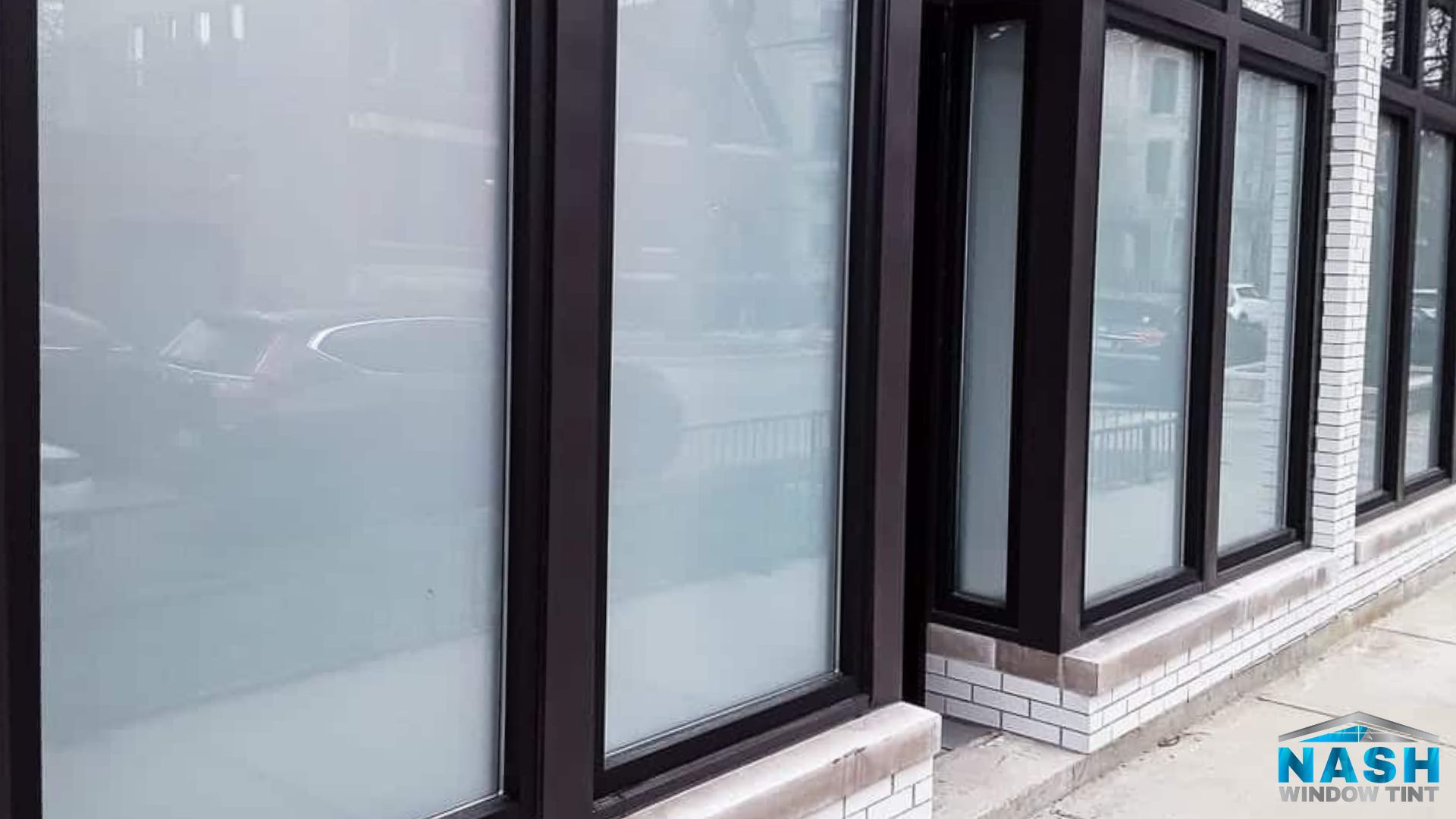 frosted window film installation on a Nashville storefront